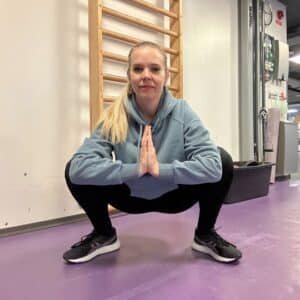 Uppvärmning squats sitta på huk övning